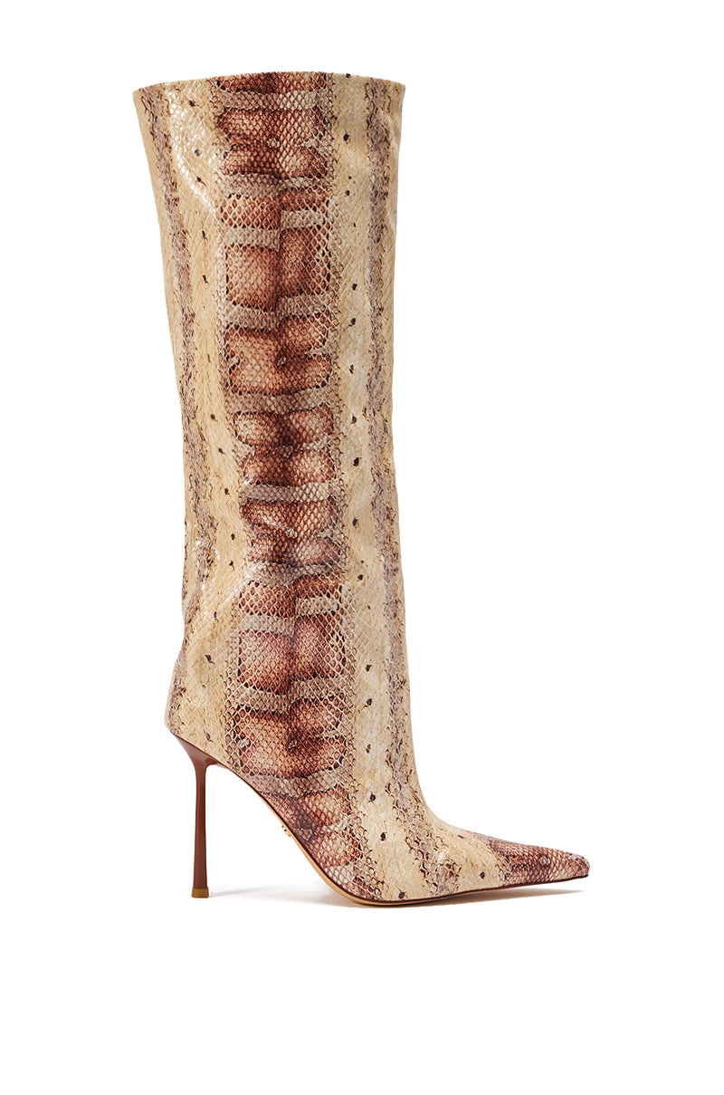 The AZALEA WANG MADEYE NUDE SNAKE STILETTO BOOT is a knee-high, pointed-toe stiletto crafted from faux leather with a shiny light brown and beige snakeskin pattern for a chic look. 7