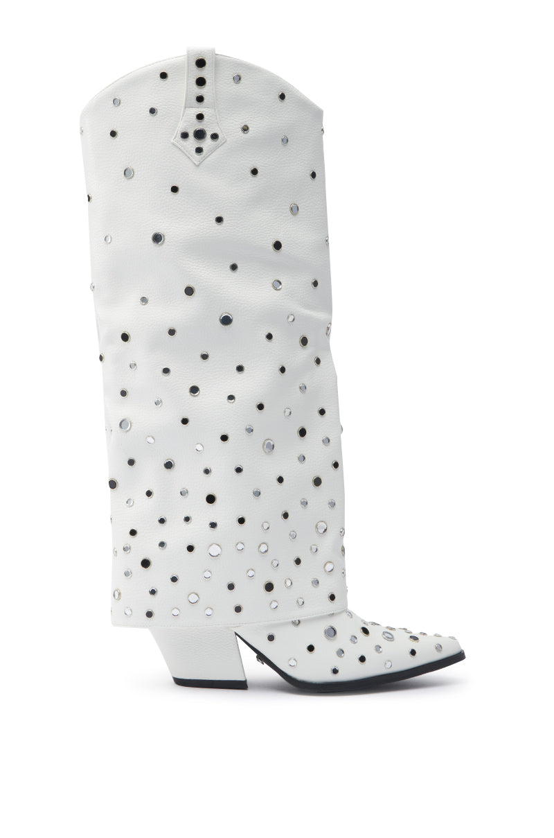 The AZALEA WANG MADLOCK WHITE EMBELLISHED WESTERN BOOT features a tall white silhouette, low heel, pointed toe, and silver studs with round accents for the ultimate rhinestone cowgirl vibe.