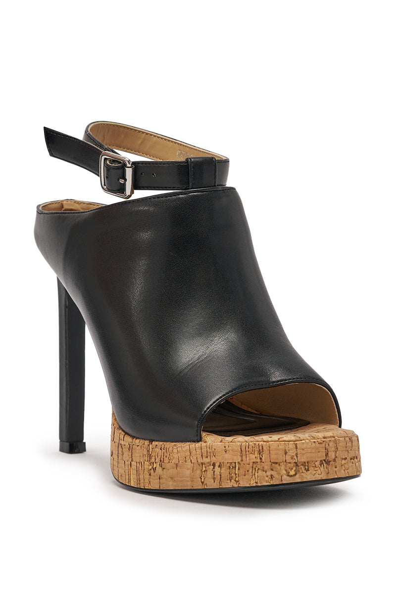The AZALEA WANG MAELIE BLACK AND CORK STILETTO SANDAL features black faux leather, an open toe, cork platform sole, ankle strap with buckle, a tall slim heel, and a comfort cushion insole for added ease. 5