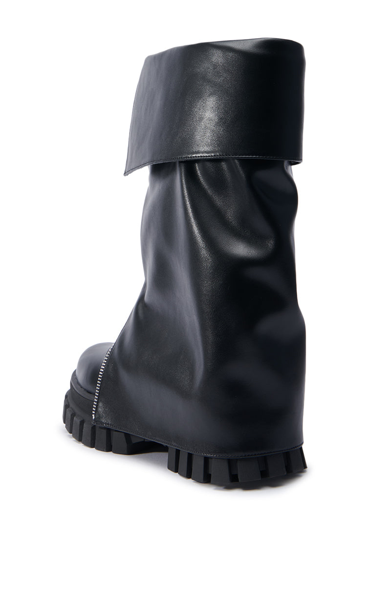 Introducing the AZALEA WANG MALEKO BLACK CHUNKY BOOT: a faux leather high-top boot featuring a thick, rugged sole and a wide, slouchy shaft that folds over at the top. This bold boot showcases visible side stitching and a glossy finish, effortlessly capturing an edgy moto style.