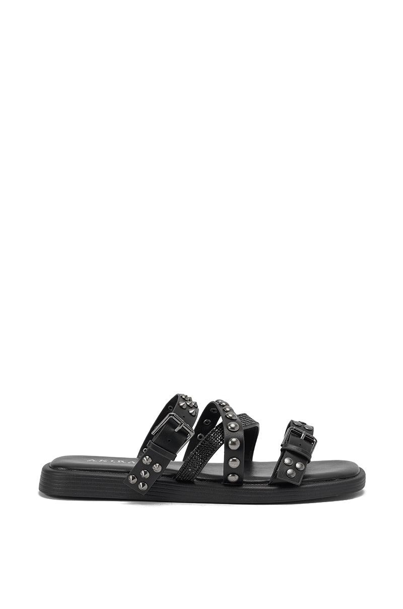 The AKIRA GOLD MANNING BLACK HARDWARE EMBELLISHED FLAT SANDAL features three adjustable buckle straps with silver stud detailing and a cushioned footbed, shown on a plain white background. 3
