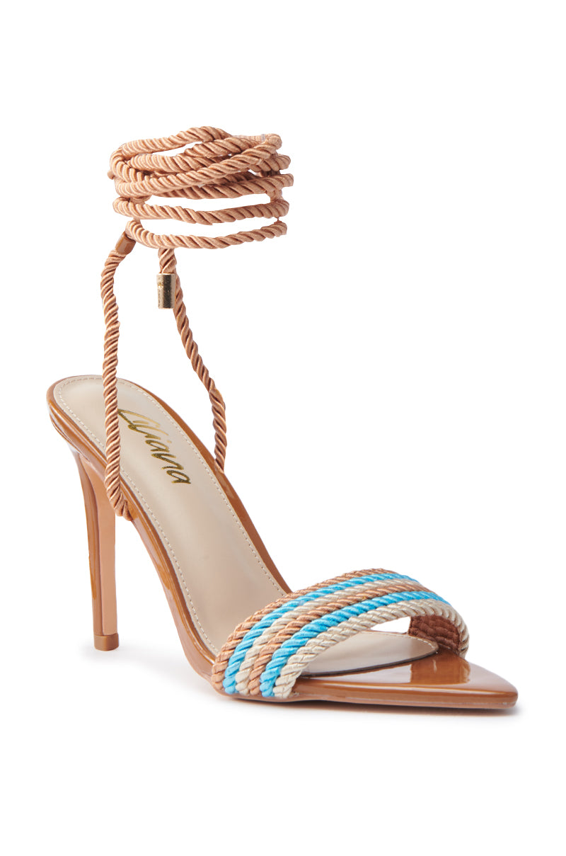 The MANSON BROWN ROPE STILETTO WRAP UP SANDAL features a tan sole and chic twisted rope straps in beige, light blue, and brown. With ankle wrap tan cords and gold tips, this stylish sandal offers an elegant, summery look perfect for any occasion.