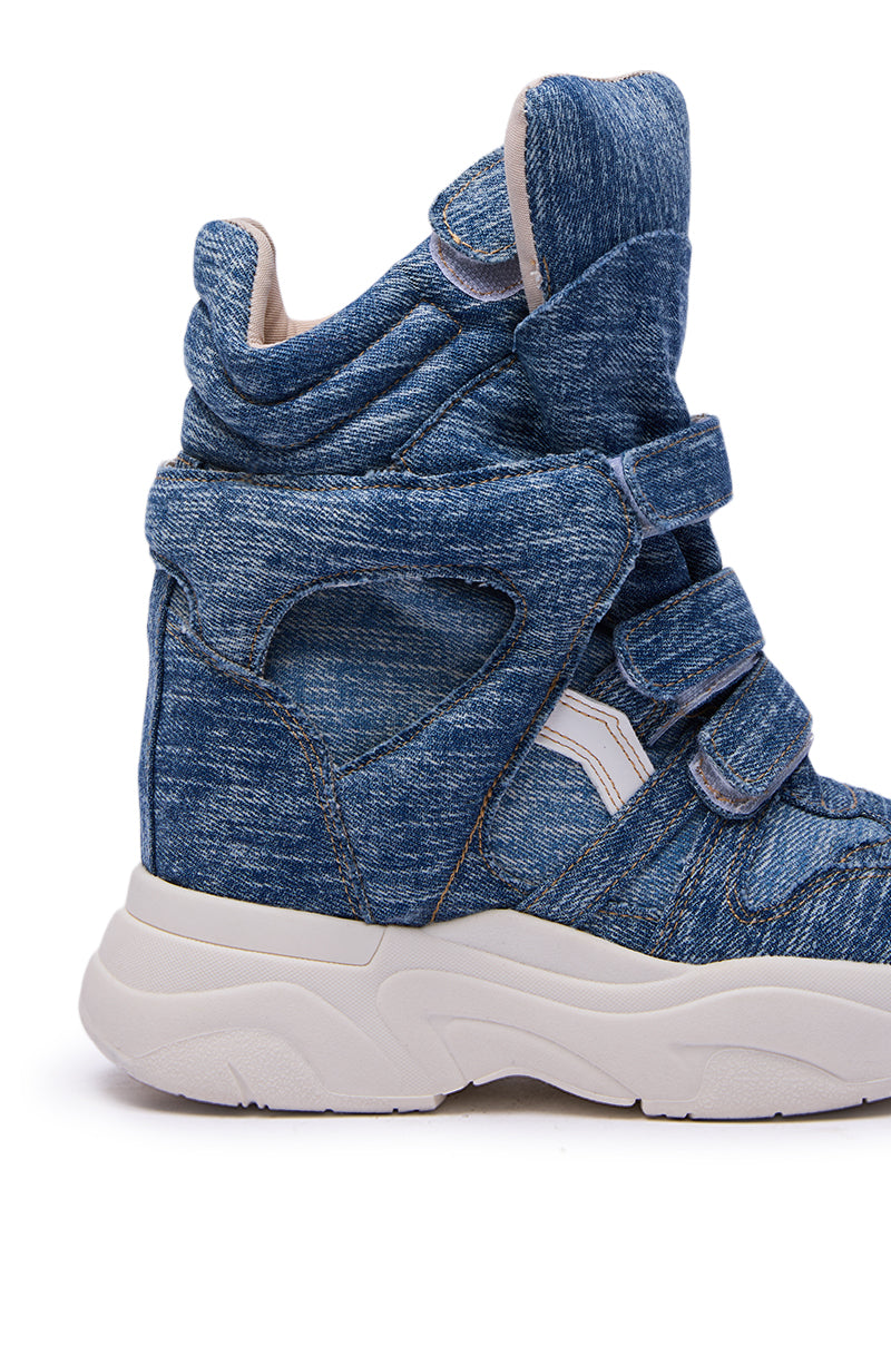 The MARANTO DENIM WEDGE SNEAKER is a high-top shoe with blue denim, three velcro straps, and a chunky white rubber sole, shown in a side view.