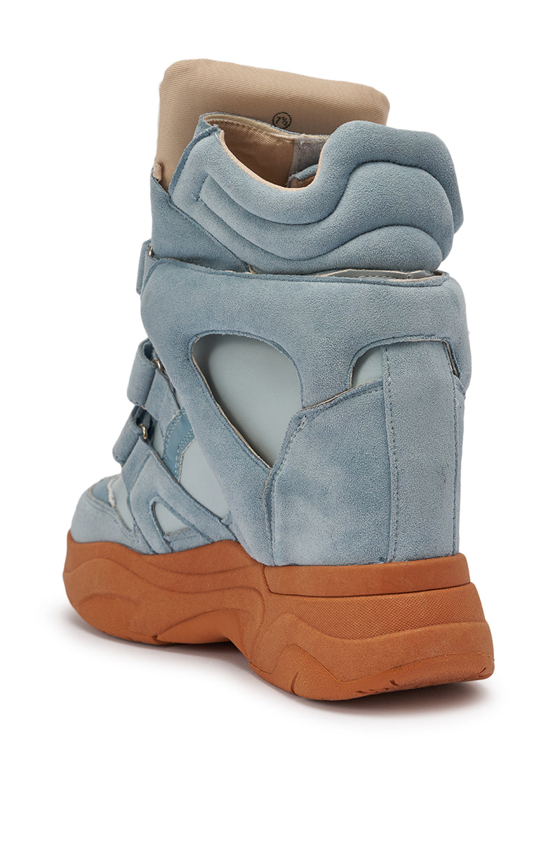 The MARANTO BLUE WEDGE FAUX SUEDE SNEAKER features a light blue suede upper, beige padded tongue, cutout accents, and a chunky brown platform sole—ideal for adding height and style to your streetwear look. 6