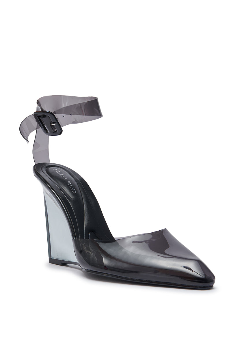 The AZALEA WANG MARCO SMOKE PVC PUMP is a stylish pointed-toe shoe in transparent black, featuring an ankle strap with buckle and a clear wedge heel. 6