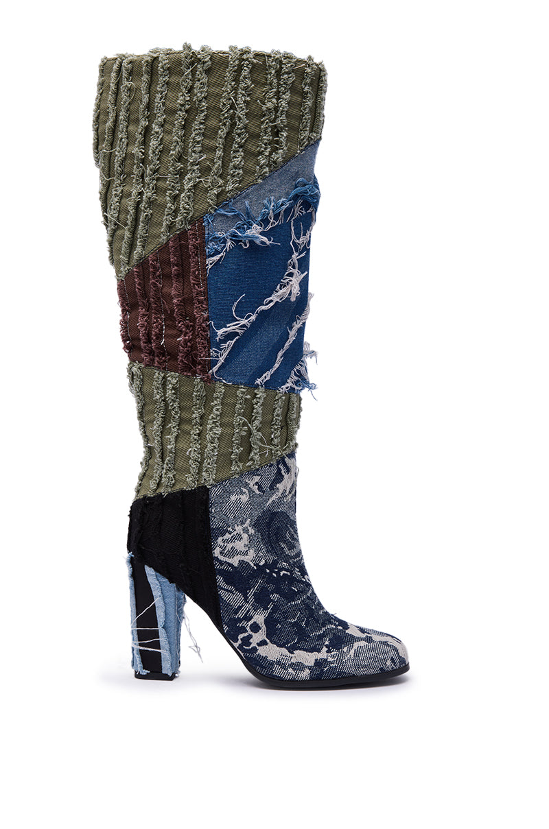 The AZALEA WANG MARGEE MULTI CHUNKY KNEE HIGH BOOT features a tall silhouette, chunky heel, and a patchwork of distressed denim with textured green, maroon, and black frayed panels for a bold, eclectic look.