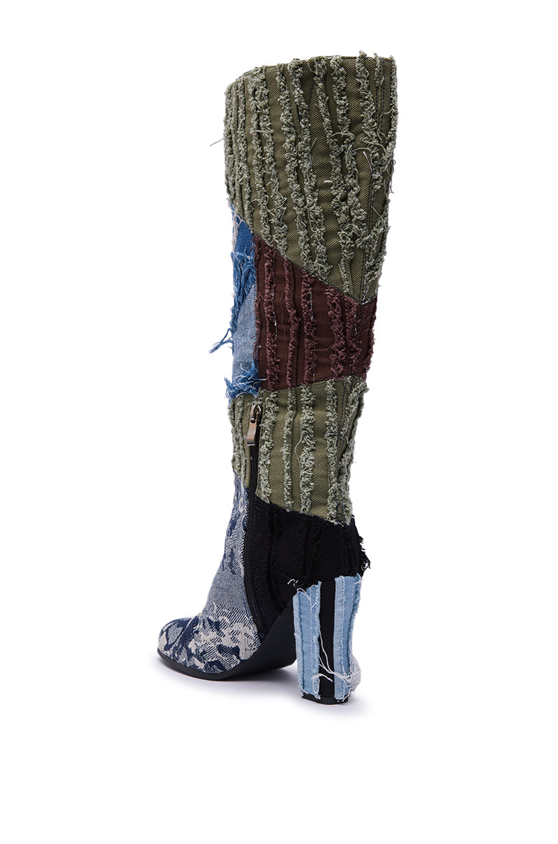 The AZALEA WANG MARGEE MULTI CHUNKY KNEE HIGH BOOT features a patchwork design in textured green, red, blue, and black fabric, visible stitching, a chunky heel, and a side zipper for a bold, eclectic look.