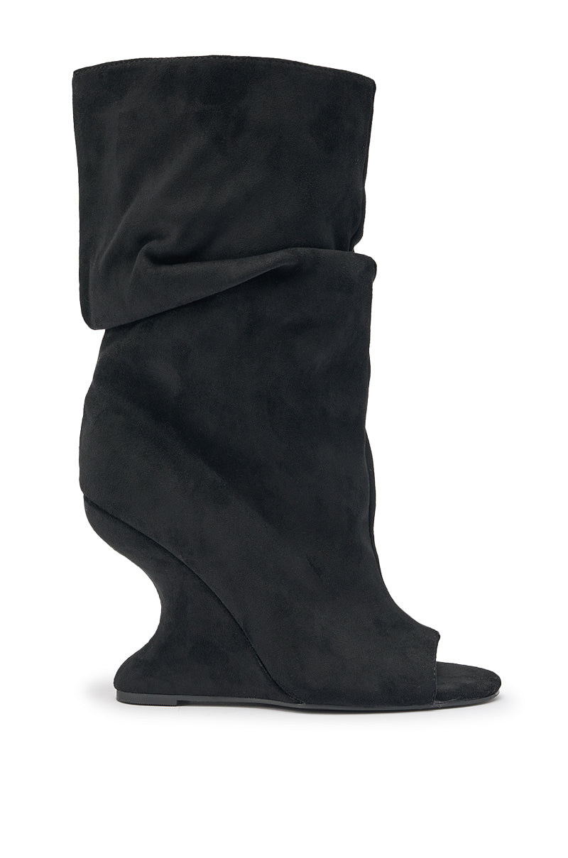 The AZALEA WANG MARIN Black Faux Suede Wedge Bootie features a slouchy wedge heel, open peep-toe, and asymmetrical sculpted design, displayed on a white background. 4