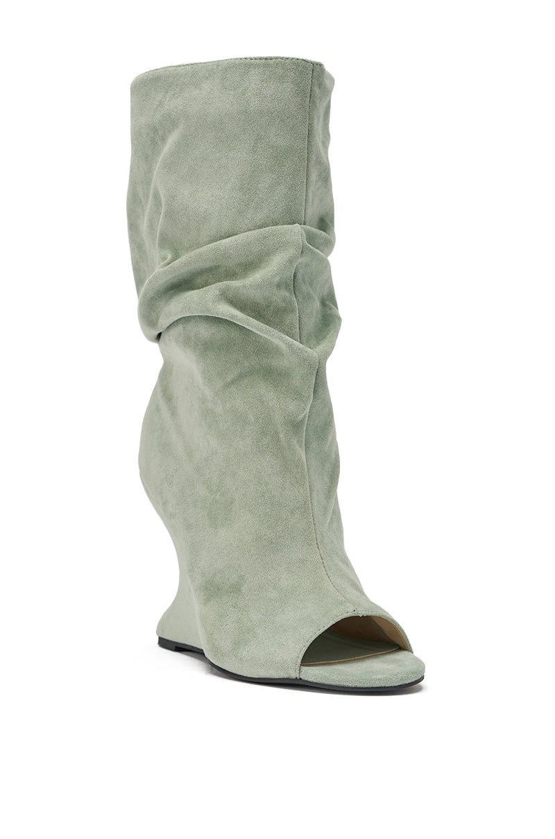The AZALEA WANG MARIN Sage Faux Suede Wedge Bootie features a sculpted heel and peep toe design, shown against a white background. 5