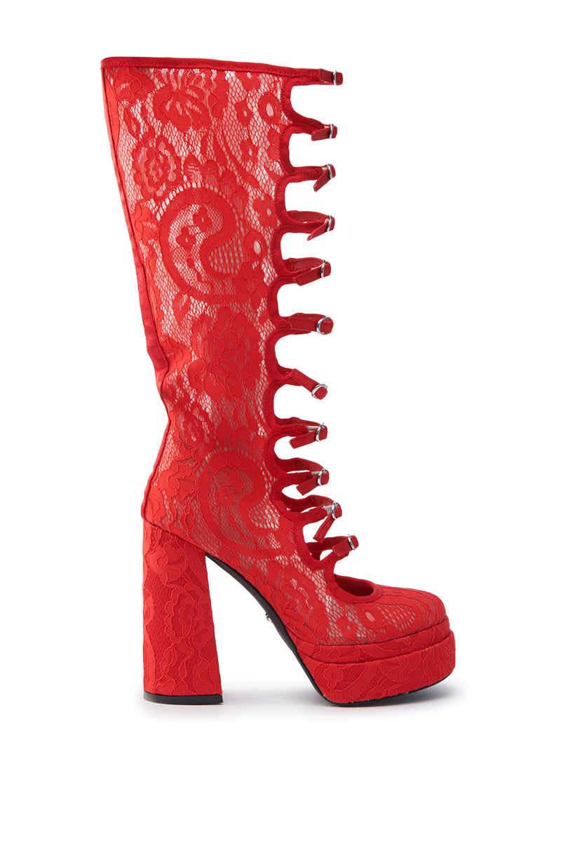 The AZALEA WANG MARRIGOLD BOOT IN RED LACE features knee-high design with a peep-toe, platform soles, chunky high heels, lace detailing, and decorative rings on the front for a bold statement.