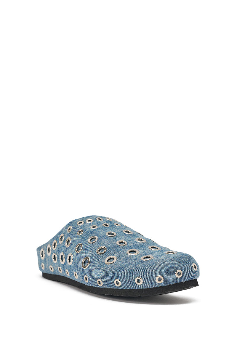 The AZALEA WANG MARSHA DENIM GROMMET DETAIL FLAT is a blue slip-on shoe with silver grommet accents and a flat black sole, showcasing bold street style against a plain white background. 5