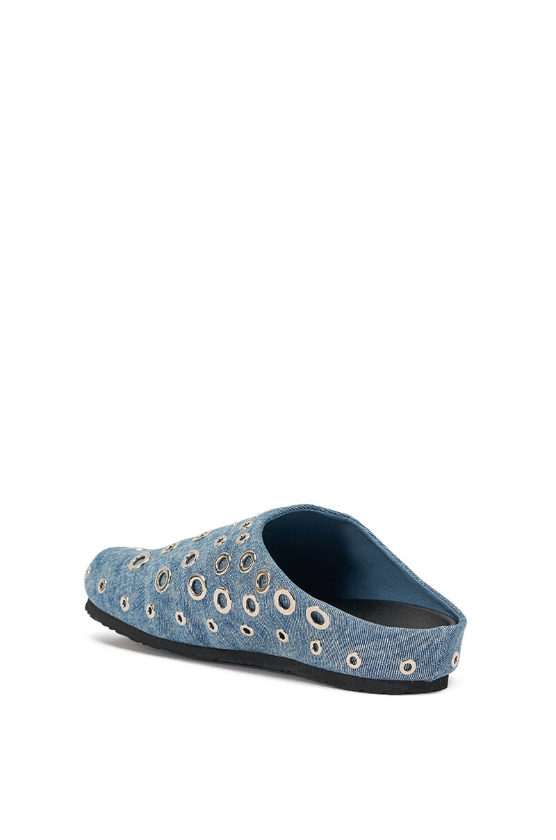 The AZALEA WANG MARSHA DENIM GROMMET DETAIL FLAT is a blue slip-on shoe with silver grommet accents and a black sole, displayed against a white background. 6