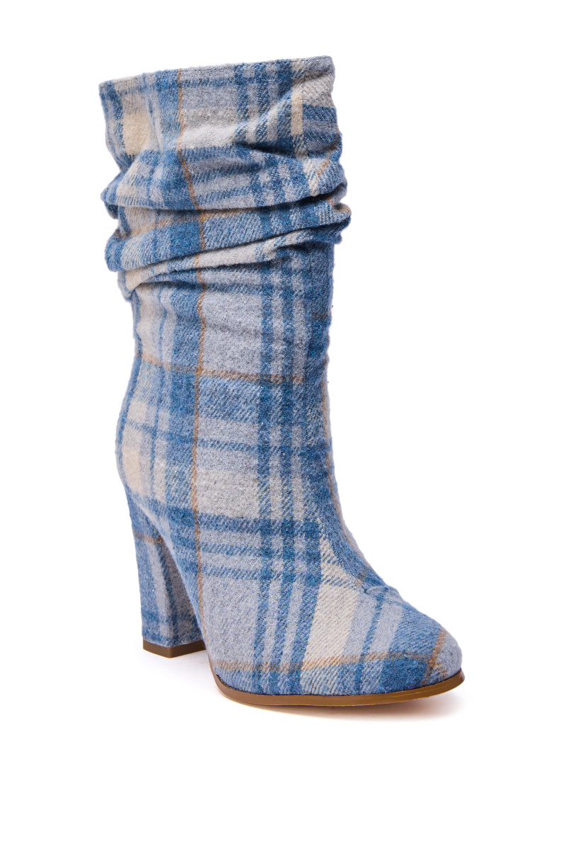 The AZALEA WANG MATHAIS Blue Multi Plaid Round Toe Bootie features a chunky heel, slouchy silhouette, and soft textured blue, white, and beige plaid fabric for standout style.