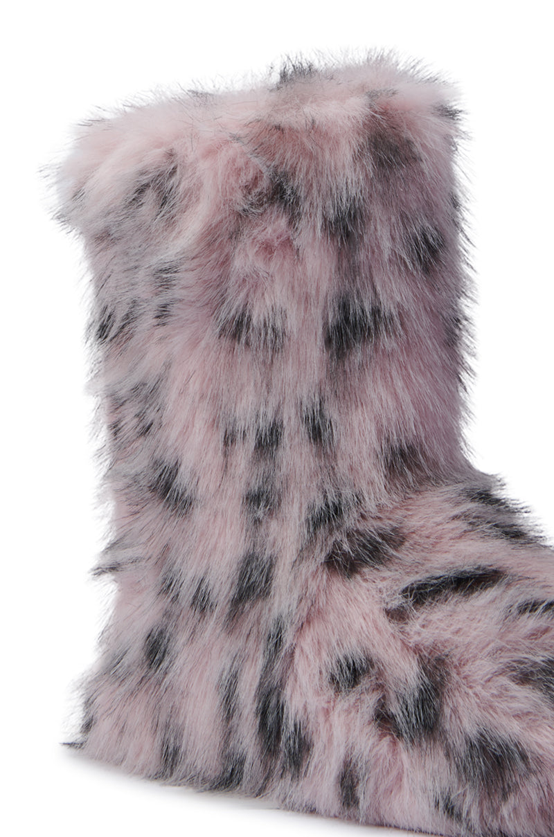 A detailed view of the MELANIE PINK LEOPARD FURRY BOOTIE showcasing its black-spotted, fluffy faux fur texture, ideal for staying stylish in cold weather.