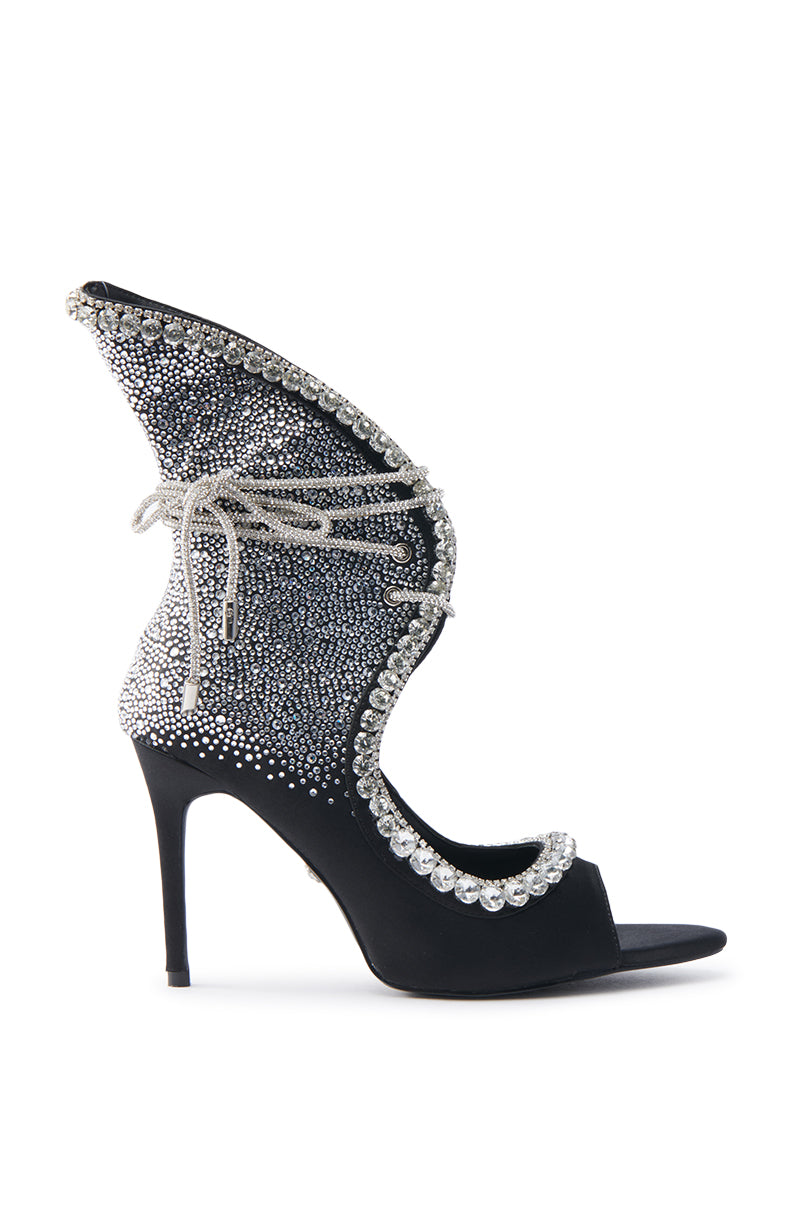 The AZALEA WANG MICAELA BLACK SILVER RHINESTONE OPEN TOE LACE UP STILETTO BOOTIE is a glamorous footwear piece featuring a unique curvy design with sparkling rhinestones, open toe, lace-up detail, satin upper in black with metallic accents, and a dramatic extended heel collar for elegant sophistication.