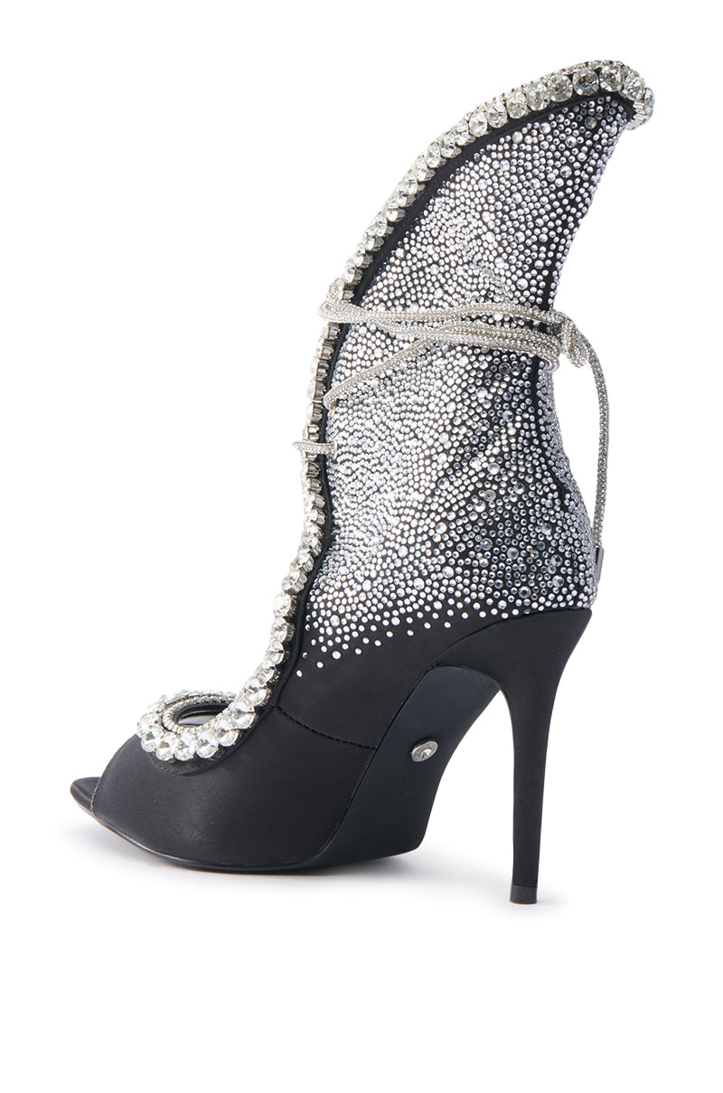 The AZALEA WANG MICAELA bootie features a sculptural design with black fabric, a pattern of silver gemstones, lace-up style, tall curved back, and thin silver cord for an artistic look.