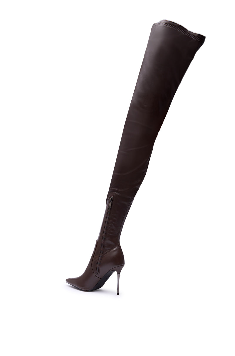 The AZALEA WANG MILANDRA CHOCOLATE THIGH HIGH SEXY BOOT features dark brown faux leather, a pointed toe, stiletto heel, and inside zipper, displayed at an angle against a white background.