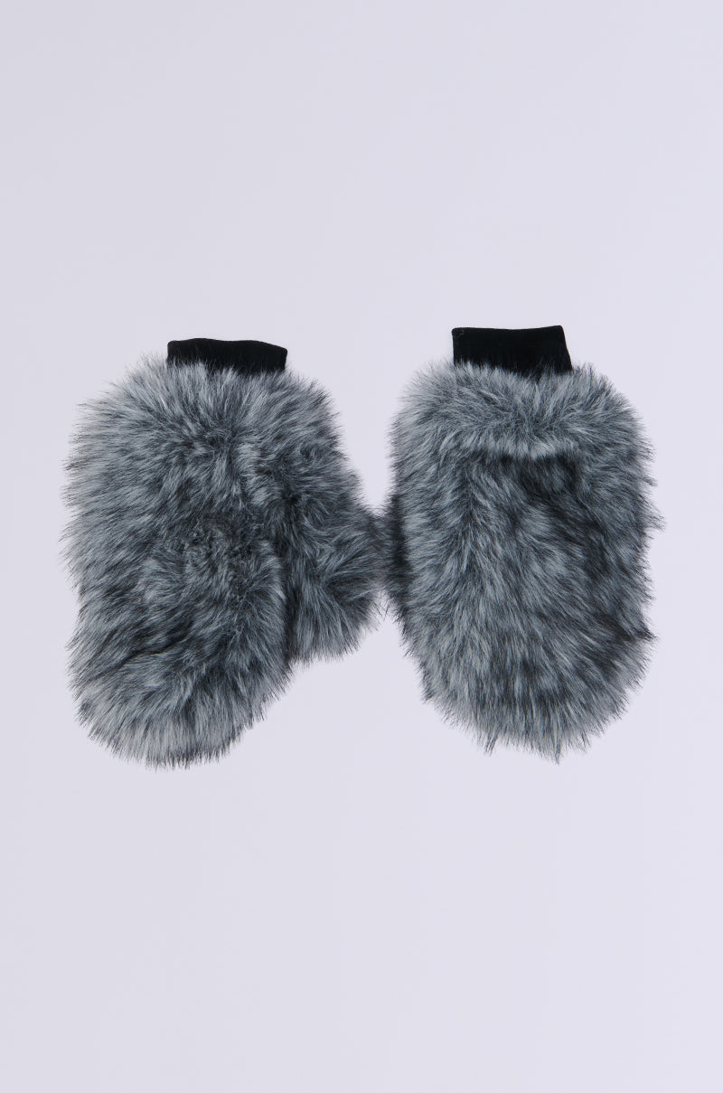 The TSUNAMI FAUX FUR MITTENS from the AKIRA Label are fluffy gray with black cuffs, showcased against a light gray background.