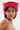 A person with short dark hair and facial piercings wears the ROSES ARE RED COWBOY HAT, featuring rhinestone rose motifs. They display brown makeup swatches on their shoulder against a plain, light background.
