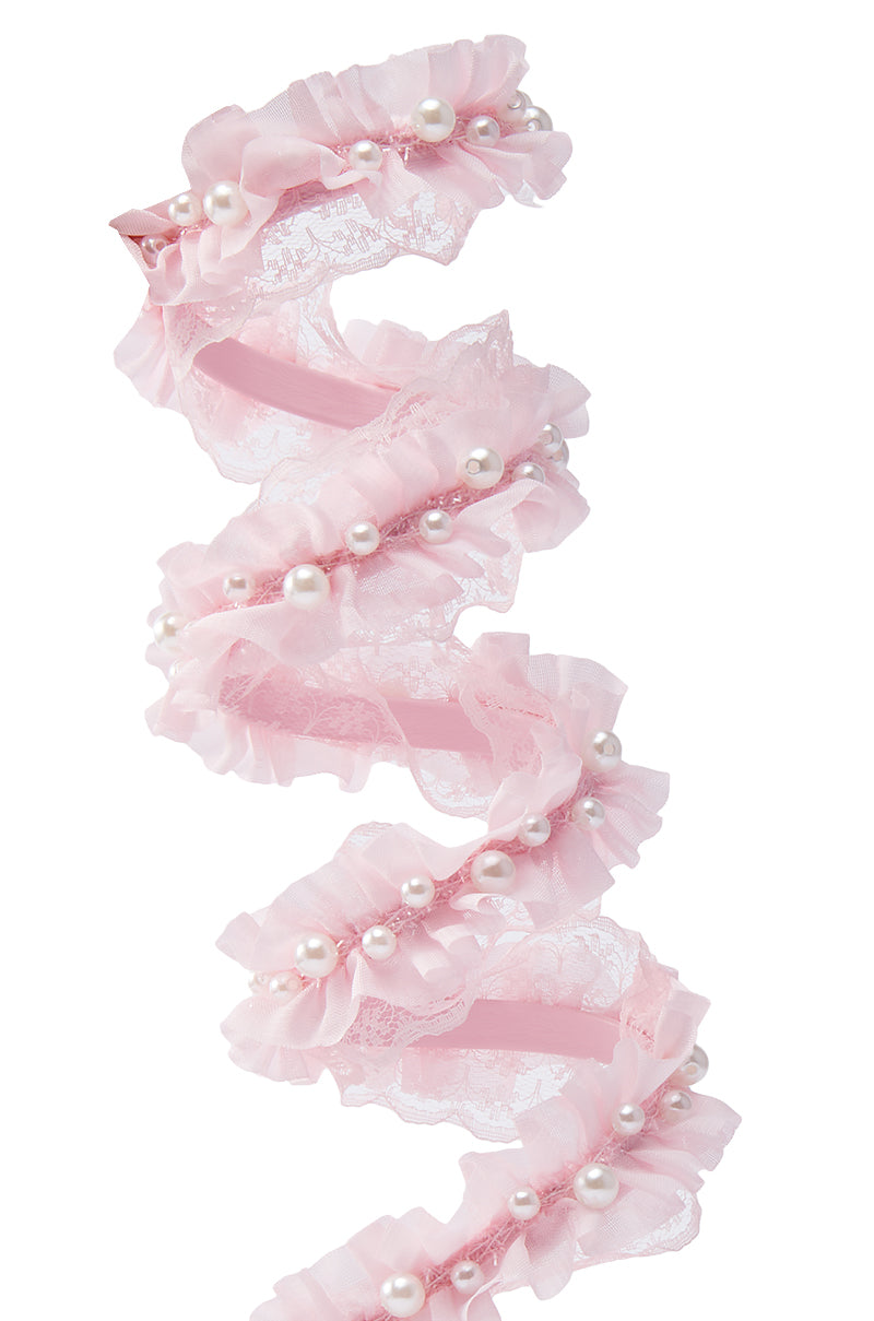 The AZALEA WANG MORINE Pink Sandal features a spiral strap adorned with ruffled lace trim, pink ribbon, and elegant pearl accents.