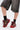 Wearing black socks, knee-length faded black denim shorts, and AZALEA WANG NAMIDA BURGUNDY SNEAKER with platform rubber outsole and red laces on a white background—showcasing authentic streetwear style.