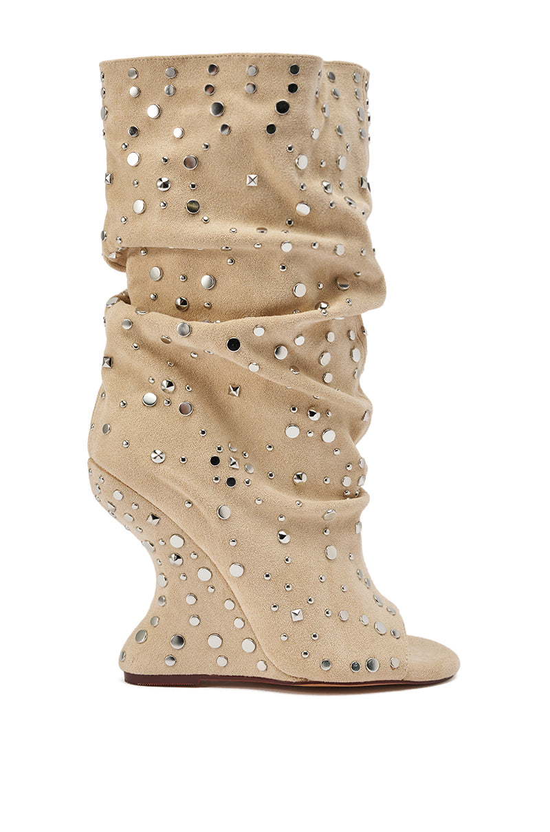 The AZALEA WANG NAOMANI FAUX SUEDE BEIGE STUDDED OPEN TOE HEEL features a boho-chic curved wedge, silver studs, rhinestones, a peep toe, and soft faux suede for an effortlessly stylish look. 5