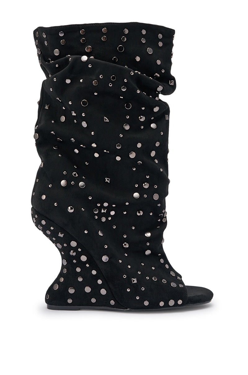 The AZALEA WANG NAOMANI Faux Suede Black Studded Open Toe Bootie features black faux suede with metallic studs and grommets, displayed on a white background. 5