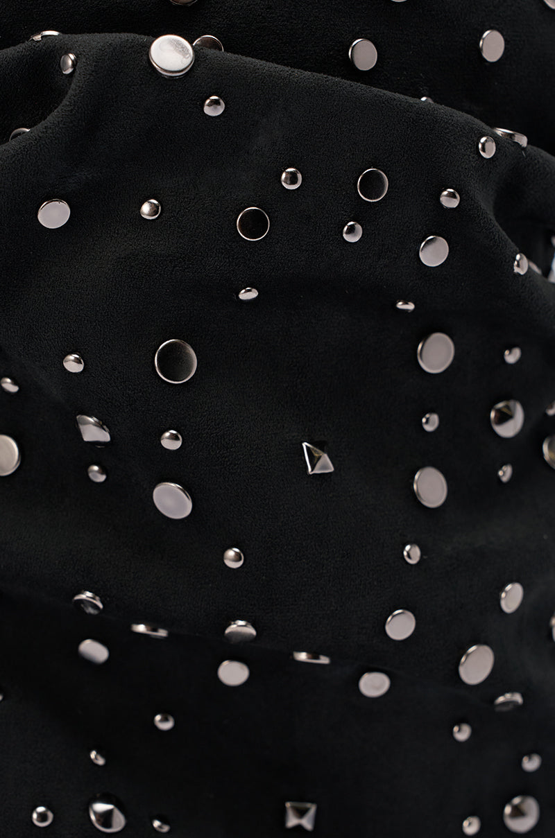 Close-up of the AZALEA WANG NAOMANI FAUX SUEDE BLACK STUDDED OPEN TOE BOOTIE shows black faux suede embellished with silver studs and circular rivets, creating a rocker-chic textured look. 8