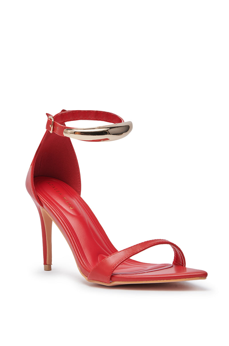 The AZALEA WANG NEMTI RED PU WITH GOLD EMBELLISHMENT SANDAL features a sleek stiletto heel, a thin ankle strap with gold buckle, and toe strap, displayed on a white background for an elegant look. 3