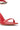 Close-up of the AZALEA WANG NEMTI RED PU WITH GOLD EMBELLISHMENT SANDAL, a stylish red faux leather stiletto with a thin front strap and a metallic gold-embellished ankle strap, displayed against a white background.