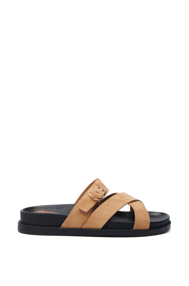 The AZALEA WANG NESSAROSE TAN FAUX SUEDE SANDAL features an open almond toe, sleek black flatform sole, two wide crisscrossed straps, an additional strap, and a small buckle for simple and stylish casual wear.