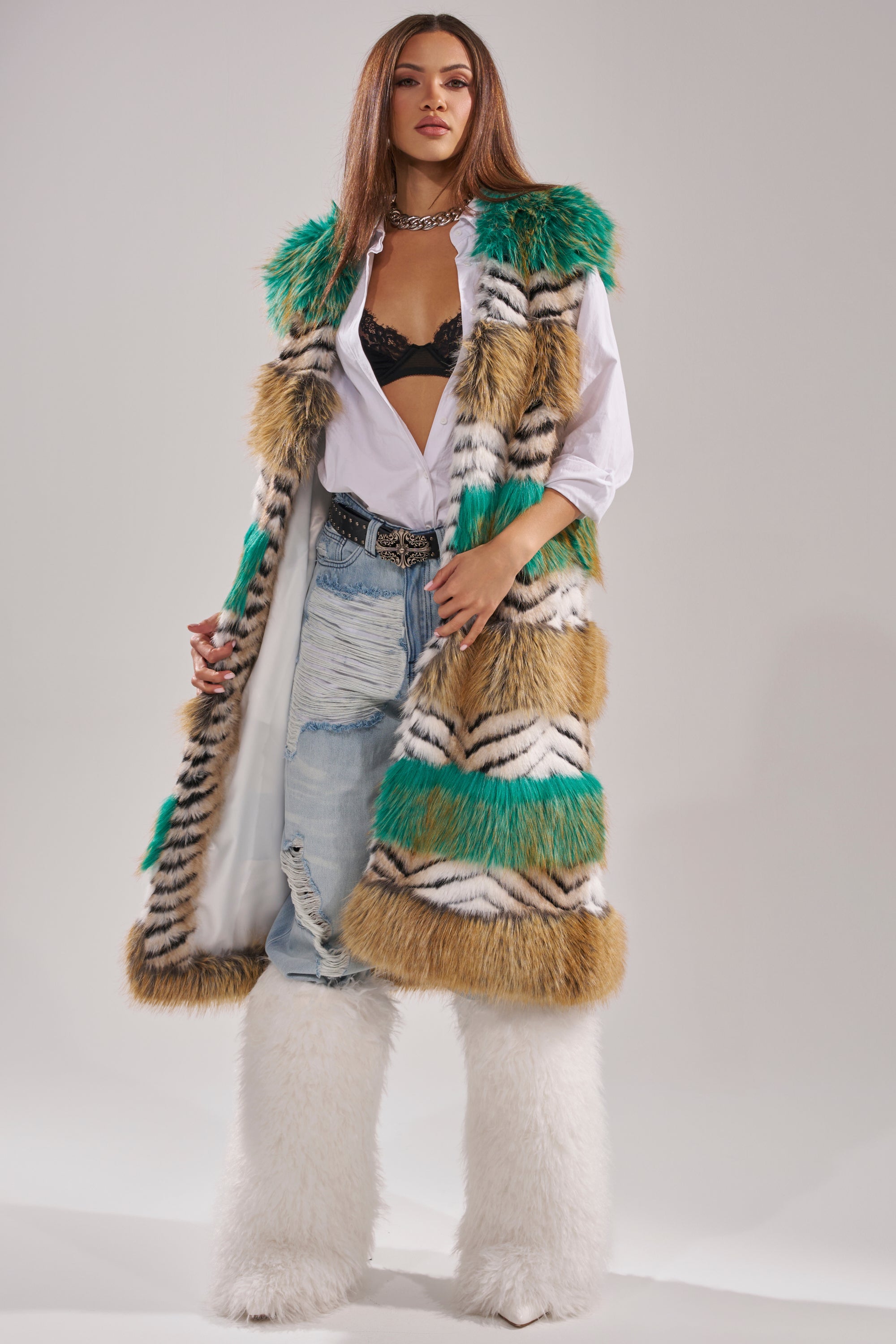 A woman in the HYDE PARK FAUX FUR VEST, a luxurious longline winter vest. 3