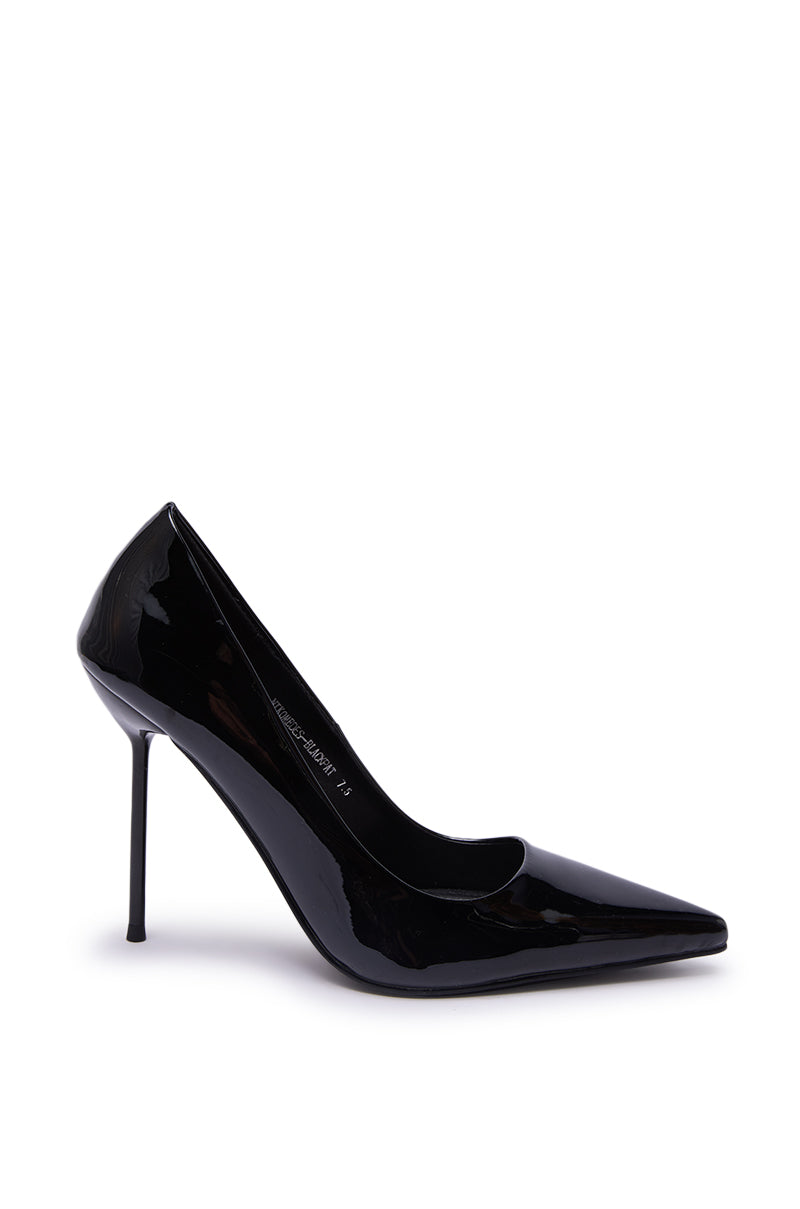 The AZALEA WANG NIKOMEDES BLACK PATENT STILETTO PUMP, crafted in sleek faux patent leather with a pointed toe, is shown in profile on a white background.