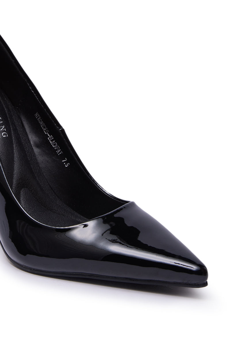 Close-up of the AZALEA WANG NIKOMEDES BLACK PATENT STILETTO PUMP, featuring a glossy black pointed toe, shown on a white background with only the front section of this elegant heel visible.