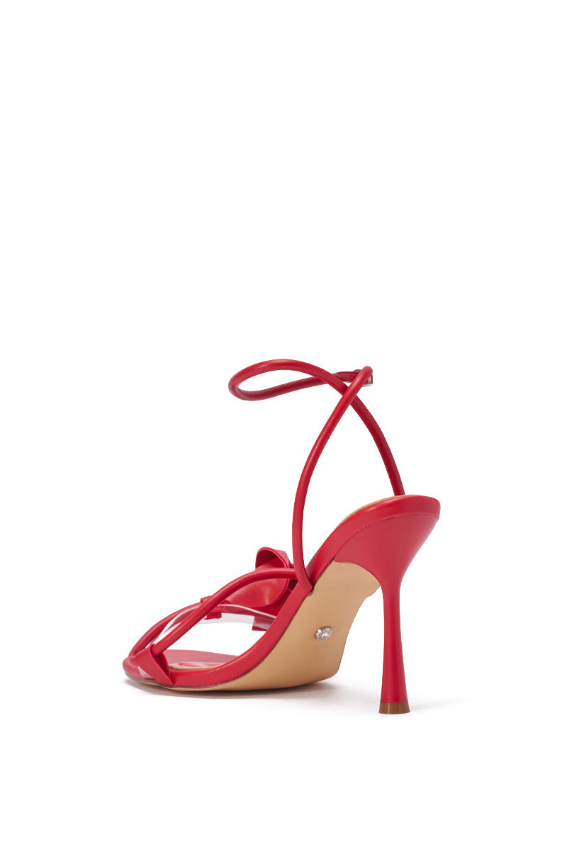 The AZALEA WANG NILOU MONOCHROME RED FLORAL DECALE STRAP STILETTO SANDAL features red faux leather straps, an ankle strap, beige sole, and slim stiletto heel, shown from back and side on a white background. 6