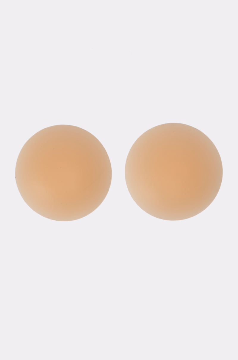 Two TITSY ADHESIVE SILICONE NIPPIE PETALS are shown side by side on a white background, highlighting these seamless, nude silicone covers designed for a discreet and comfortable fit. 3