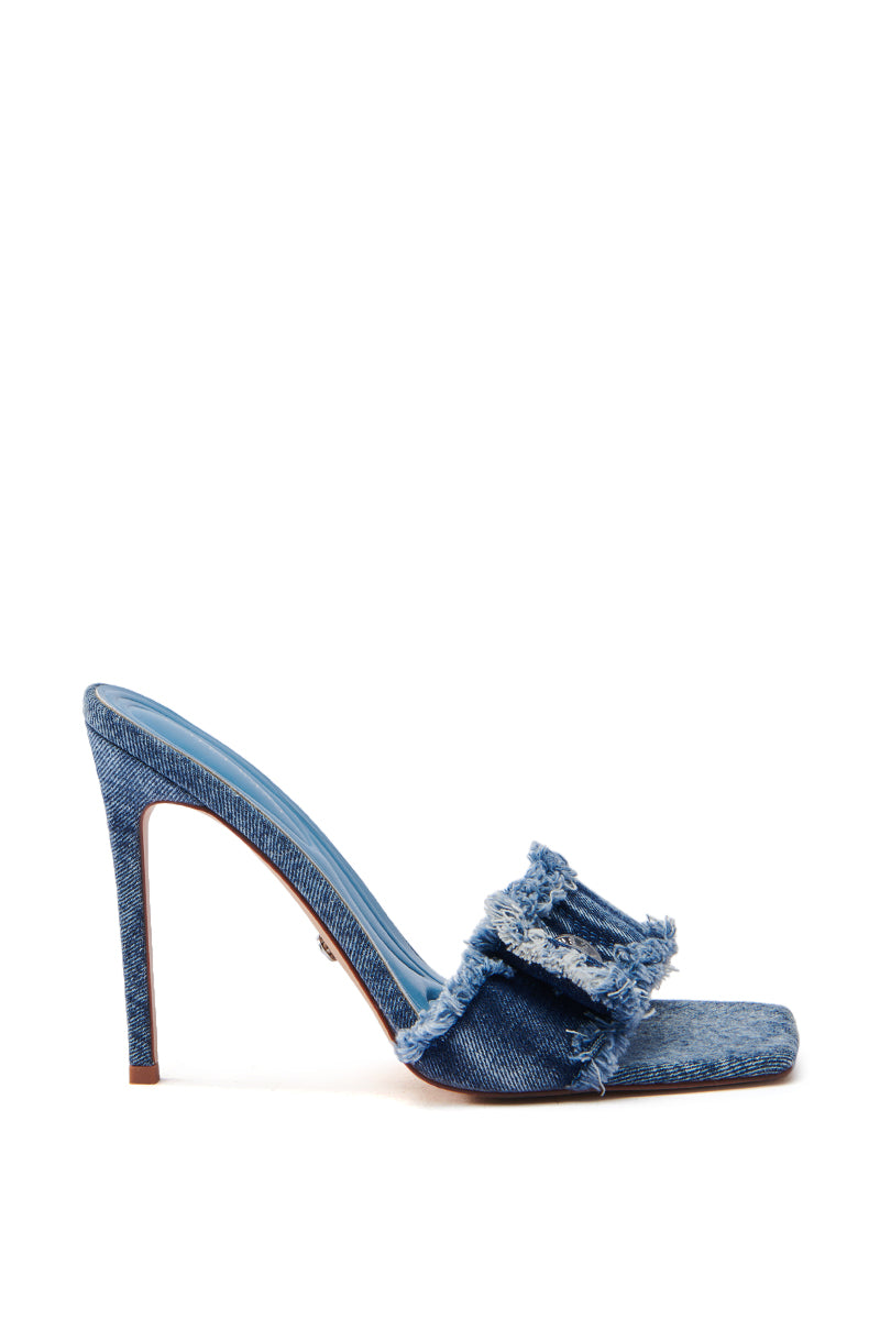 The AZALEA WANG NOBURO DENIM STILETTO SANDAL features an acid wash denim high-heeled mule design with frayed straps, a sleek silhouette, blue insole, and open square toe for added style.