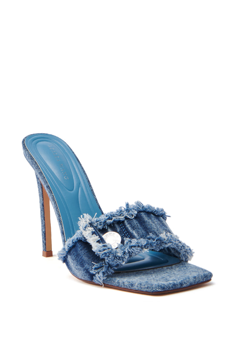 The AZALEA WANG NOBURO DENIM STILETTO SANDAL features a blue denim design, open square toe, frayed strap with decorative button, and a matching blue insole. Its tall, slender heel is perfect for making a statement.