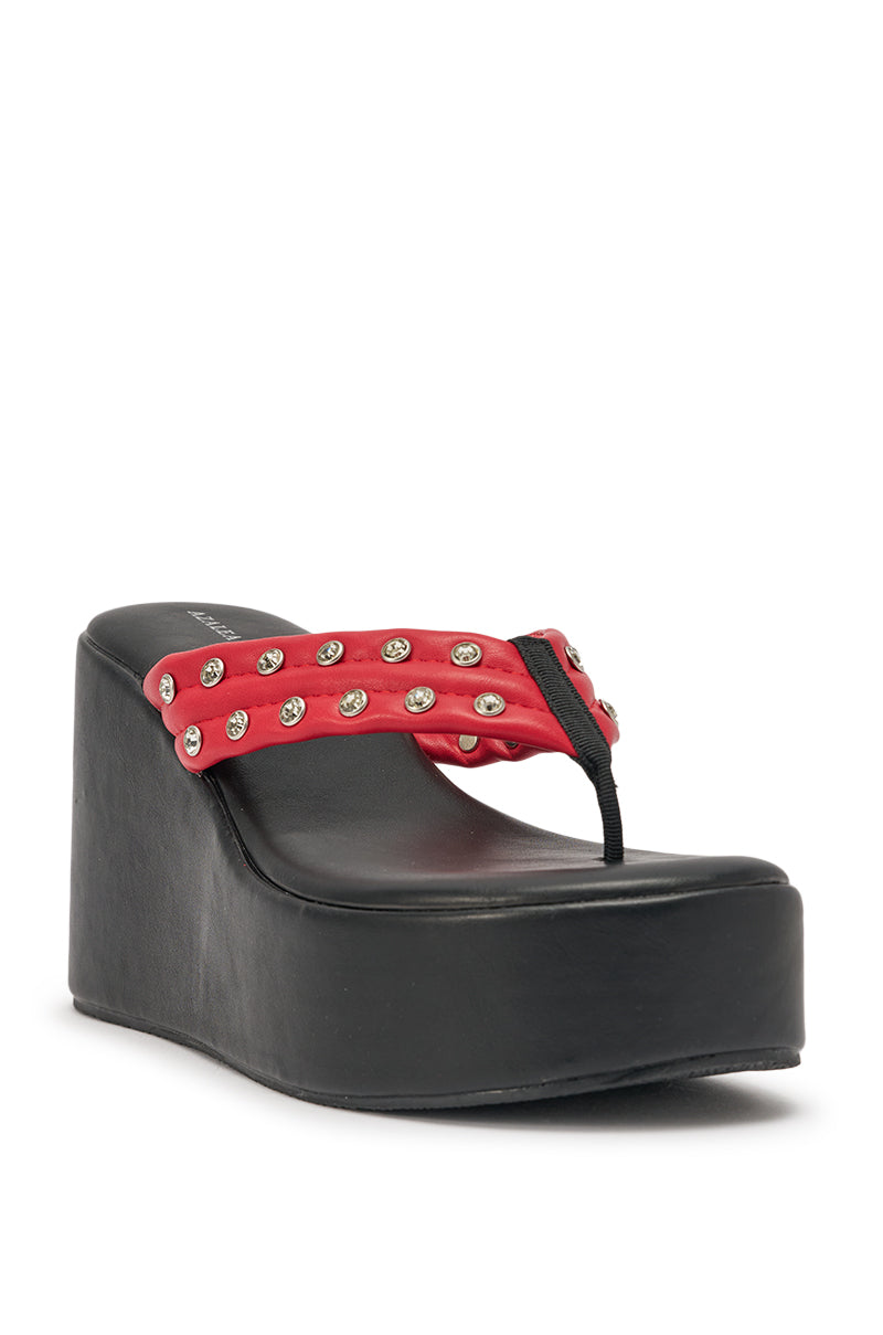 The AZALEA WANG NOVELLE Black and Red Stud Embellished Platform Sandal features a thick black sole and a bold red strap with silver studs for standout style. 4