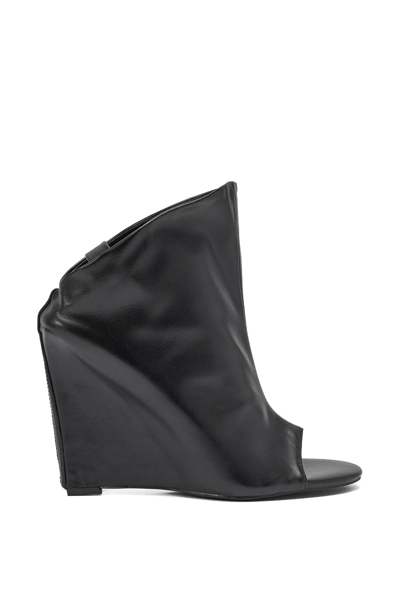 The AZALEA WANG NOVIS BLACK PU WEDGE BOOTIE is a sleek, minimalist black wedge bootie featuring a peep toe, high angular heel, and smooth surface for a modern, elegant look with no visible laces or buckles. 4