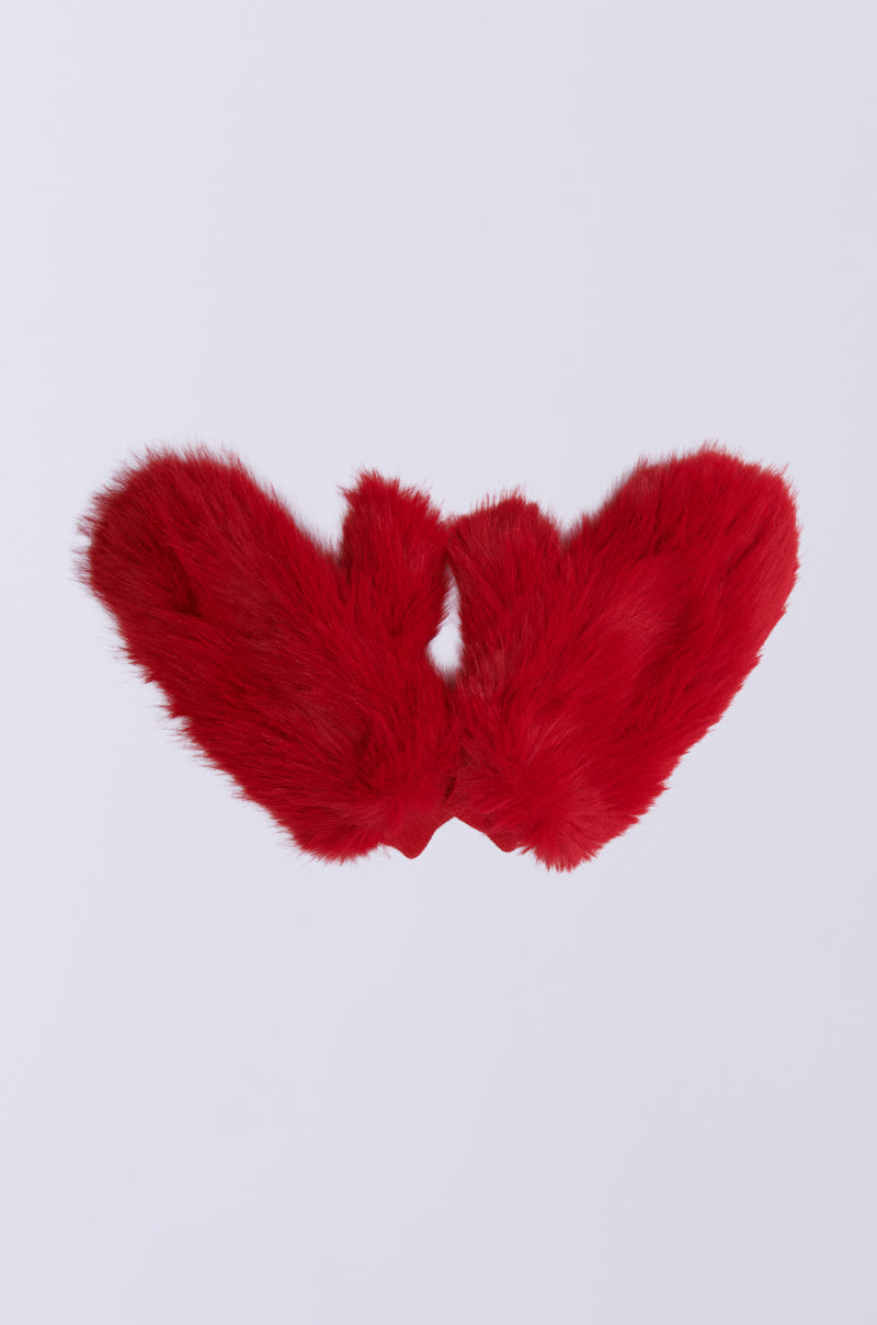 The REDDY FAUX FUR GLOVES, a pair of fluffy red mittens crafted from faux fur with a cozy inner lining, are showcased against a plain white background.