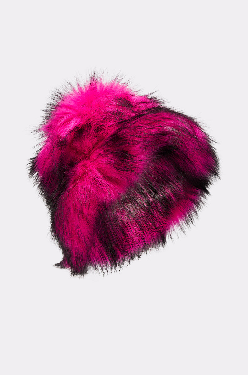 The HOTTIE FAUX FUR BUCKET HAT is a fluffy, oversized bucket hat featuring vibrant pink and black streaks, shown against a plain light gray background. 4