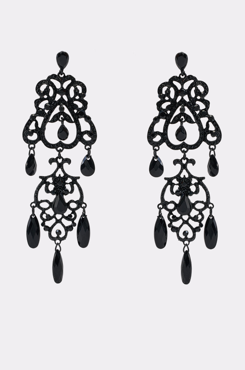 Make a dramatic statement with the CROWN JEWEL DANGLE EARRINGS—ornate black chandelier earrings featuring intricate lace-like patterns and dangling teardrop-shaped beads. These gothic-chic earrings effortlessly add a touch of elegance and edge to any look.