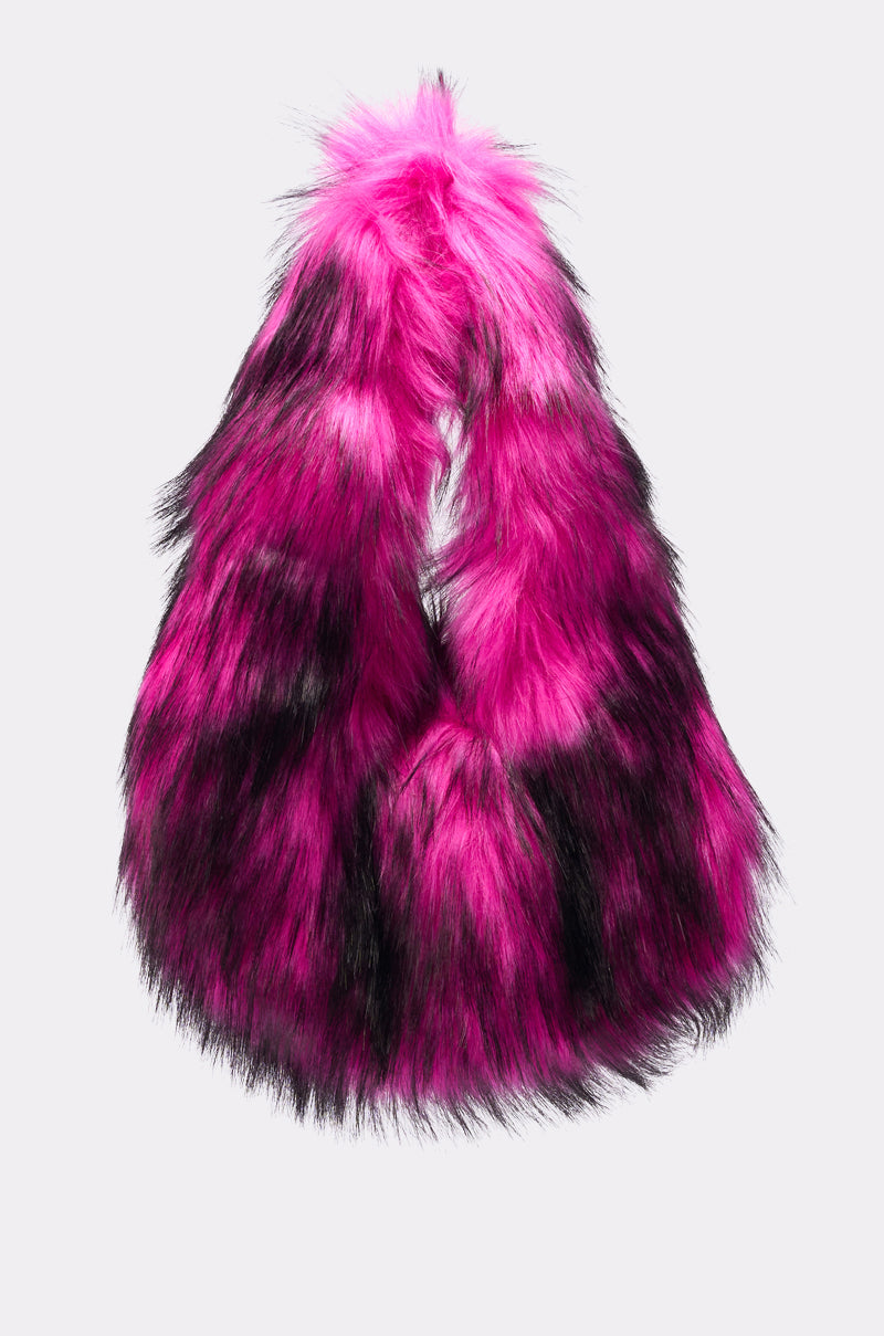 The IN NYC FAUX FUR PURSE features vibrant pink faux fur with black accents, arranged in a loop, displayed against a plain light gray background.