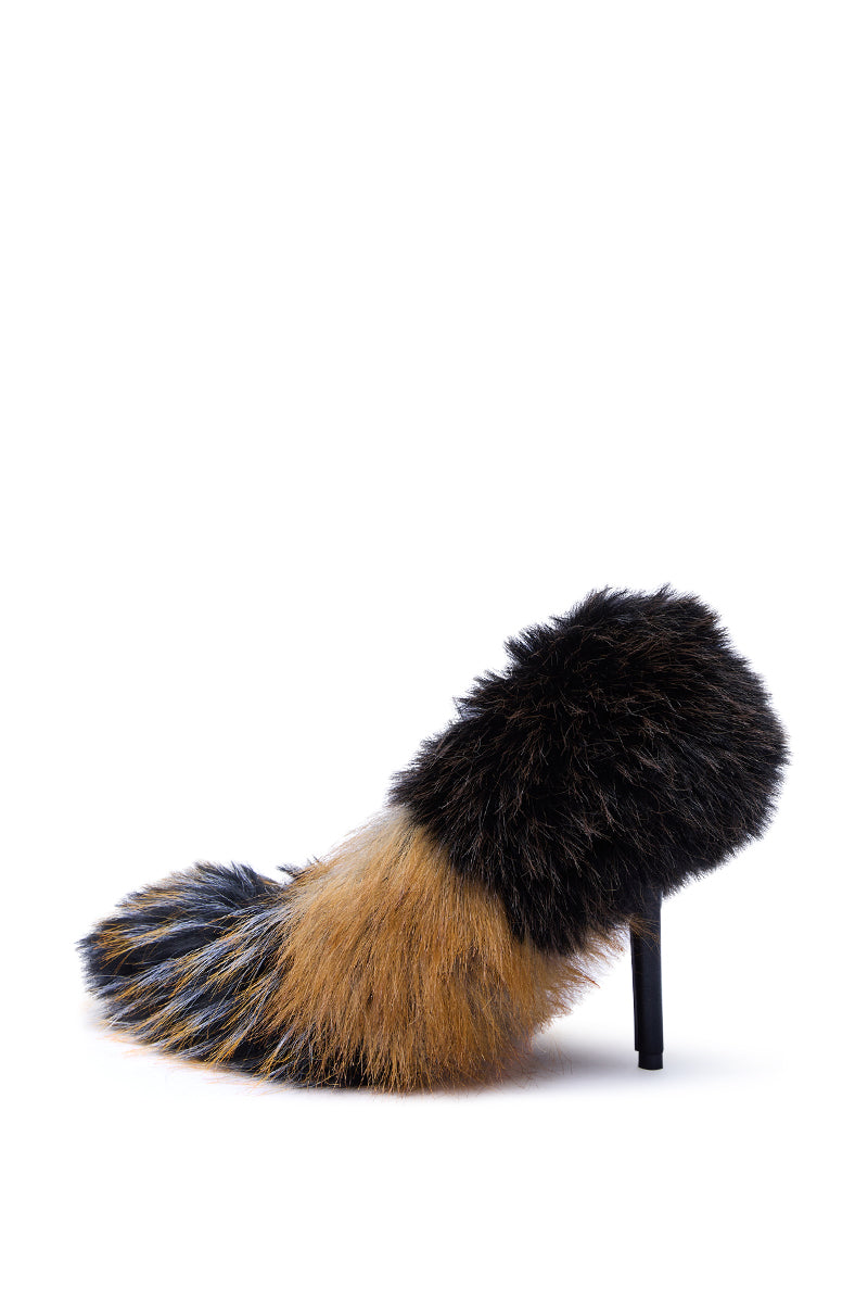 The AZALEA WANG OMIRCON BLACK AND TAN FUR STILETTO PUMP features a pointed toe and is covered in fluffy, multicolored faux fur blending black, brown, and tan shades over a white base.