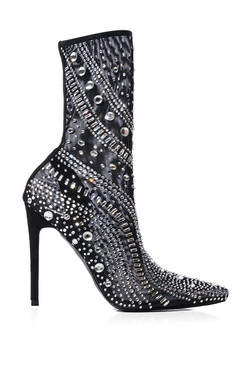 The AZALEA WANG OPRY Black Embellished Mesh Bootie features a high heel with intricate silver studs and rhinestones in a swirling pattern, adding elegance to its bold, shimmering design. 4