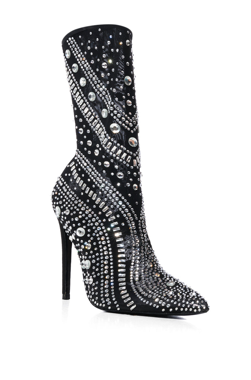 The AZALEA WANG OPRY Black Embellished Mesh Bootie is a black stiletto with swirling silver rhinestones and sequins, featuring a pointed toe and high heel for a glamorous look. 5