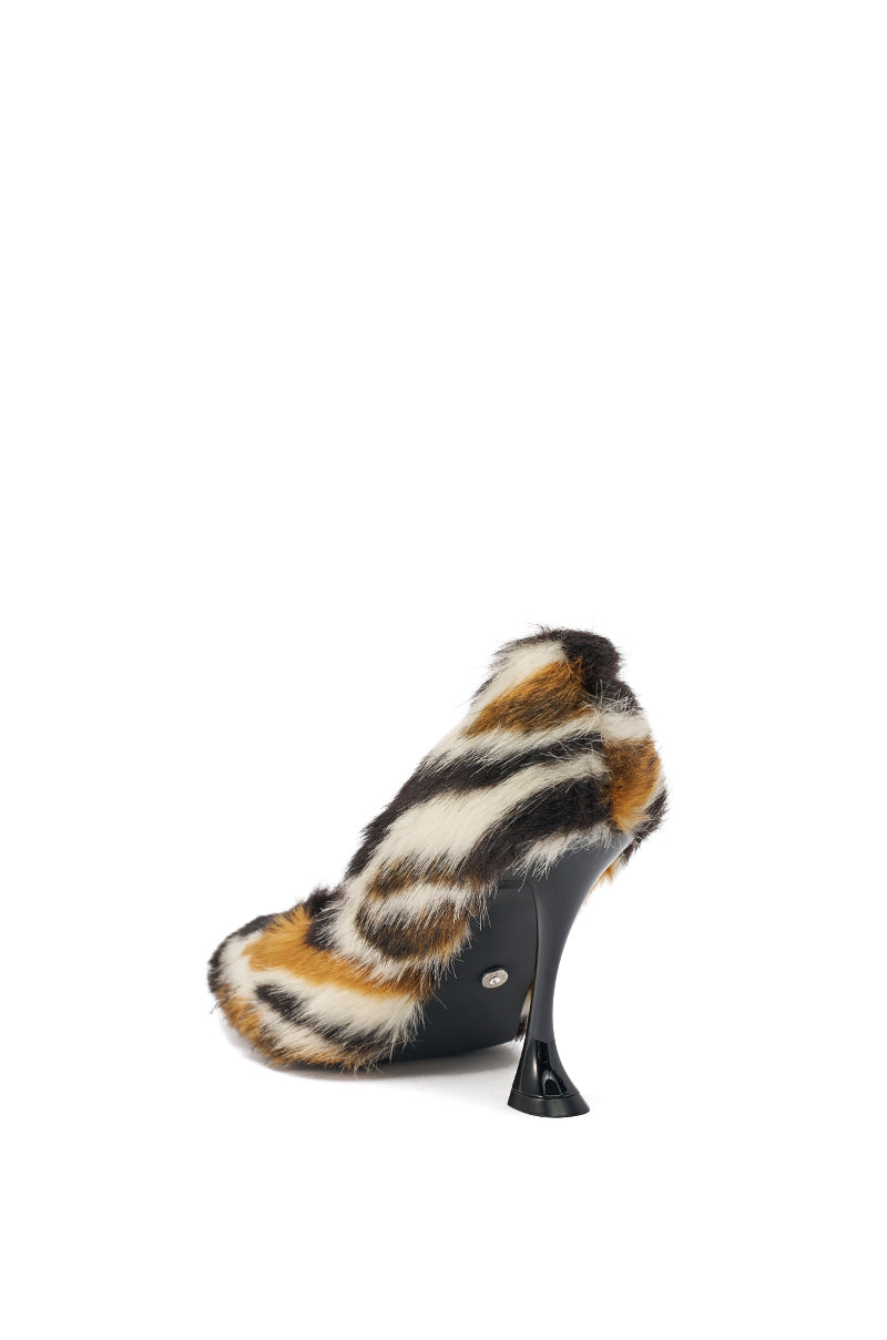 The AZALEA WANG PAULHINO FAUX FUR PUMP features a pointed toe, striped brown, black, and white faux fur upper, and a sculpted black stiletto heel, shown against a plain white background. 4