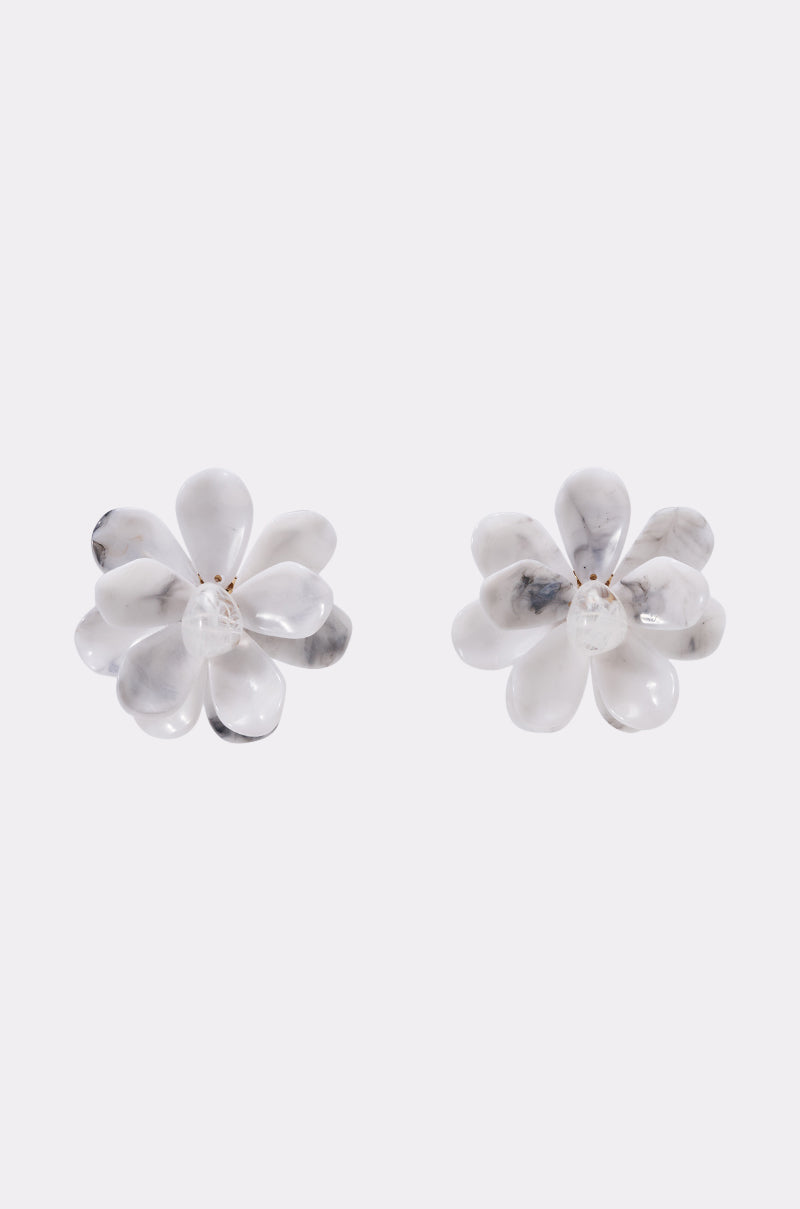 The MARBLE EARRING features lotus-inspired, marbled white acrylic with layered rounded petals, shown against a light gray background—ideal for summer jewelry collections.