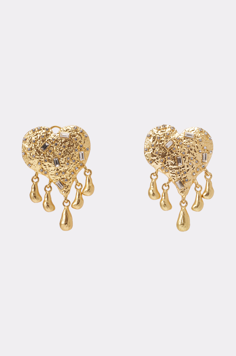 The ALL MY LOVE EARRING features gold heart shapes with a textured finish, set with small rectangular rhinestones and five dangling teardrop charms on each earring—perfect for making a stunning statement against any plain background. 0